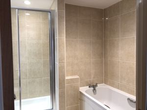 En-suite bath and separate shower- click for photo gallery